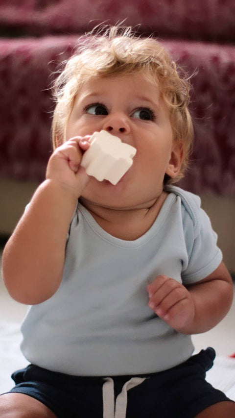 Silicone activity cube and wooden board